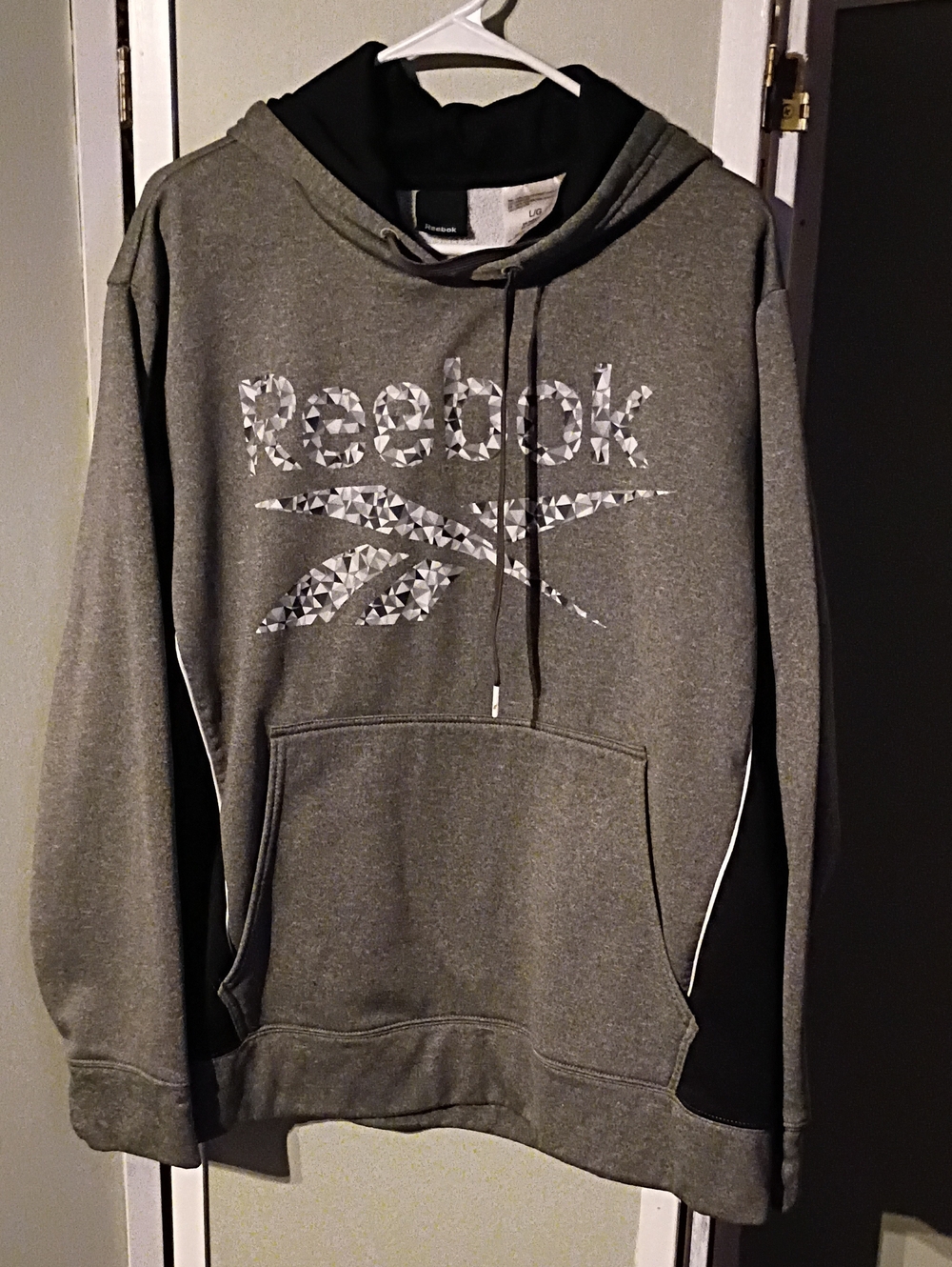 Reebok Men’s Gray Pullover Hoodie with Geometric Logo